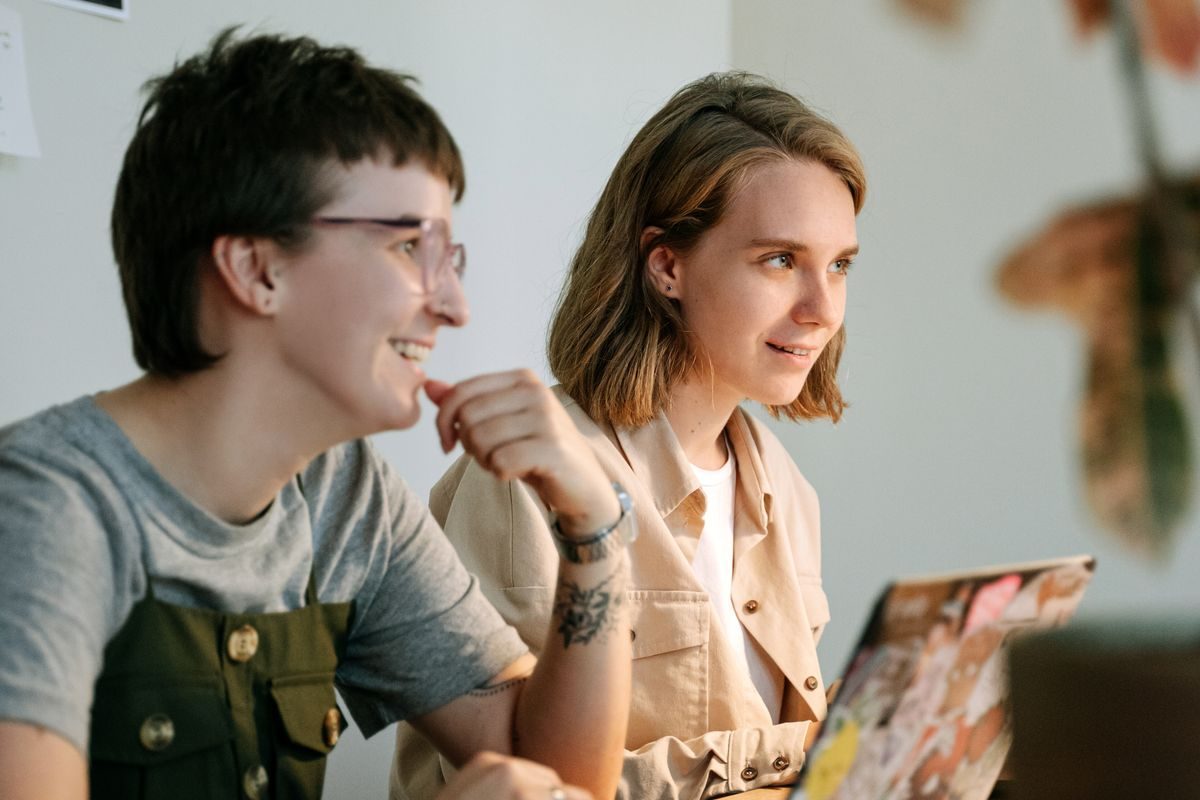 People reviewing work together